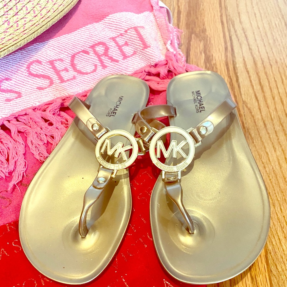 Michael Kors gold flip-flops size 6M